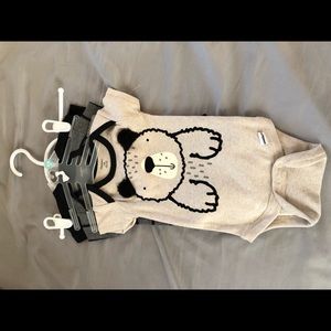 Three-piece onesie set.